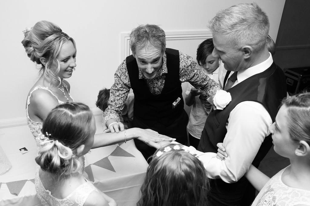 Close Up Of Martin Hinchliffe Doing Magic With Group