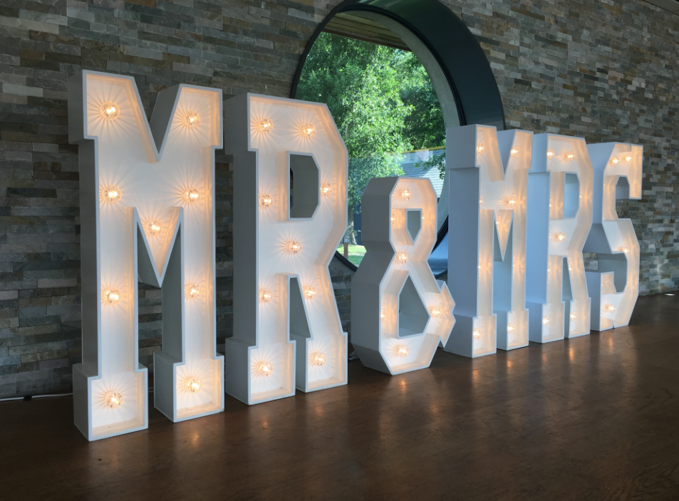 Mr & Mrs Letters set at the boathouse