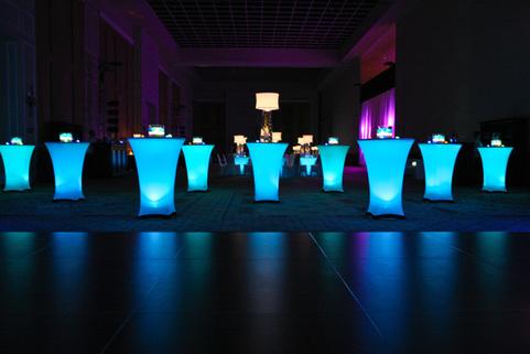 poseur table with white scrim and uplights