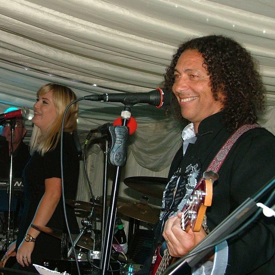 Captain Scarlett Band playing in a Marquee