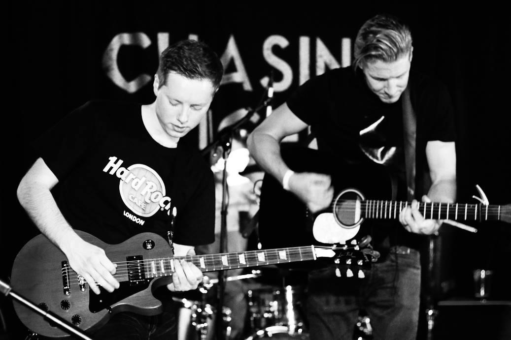 Chasing Tigers Boys in the band playing guitars